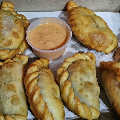 Así comenzó la historia de la empanada salteña que en Villa Elvira se saborea en 7 y 97