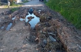 97 entre 115 y 116: La acumulación de agua hizo una calle intransitable